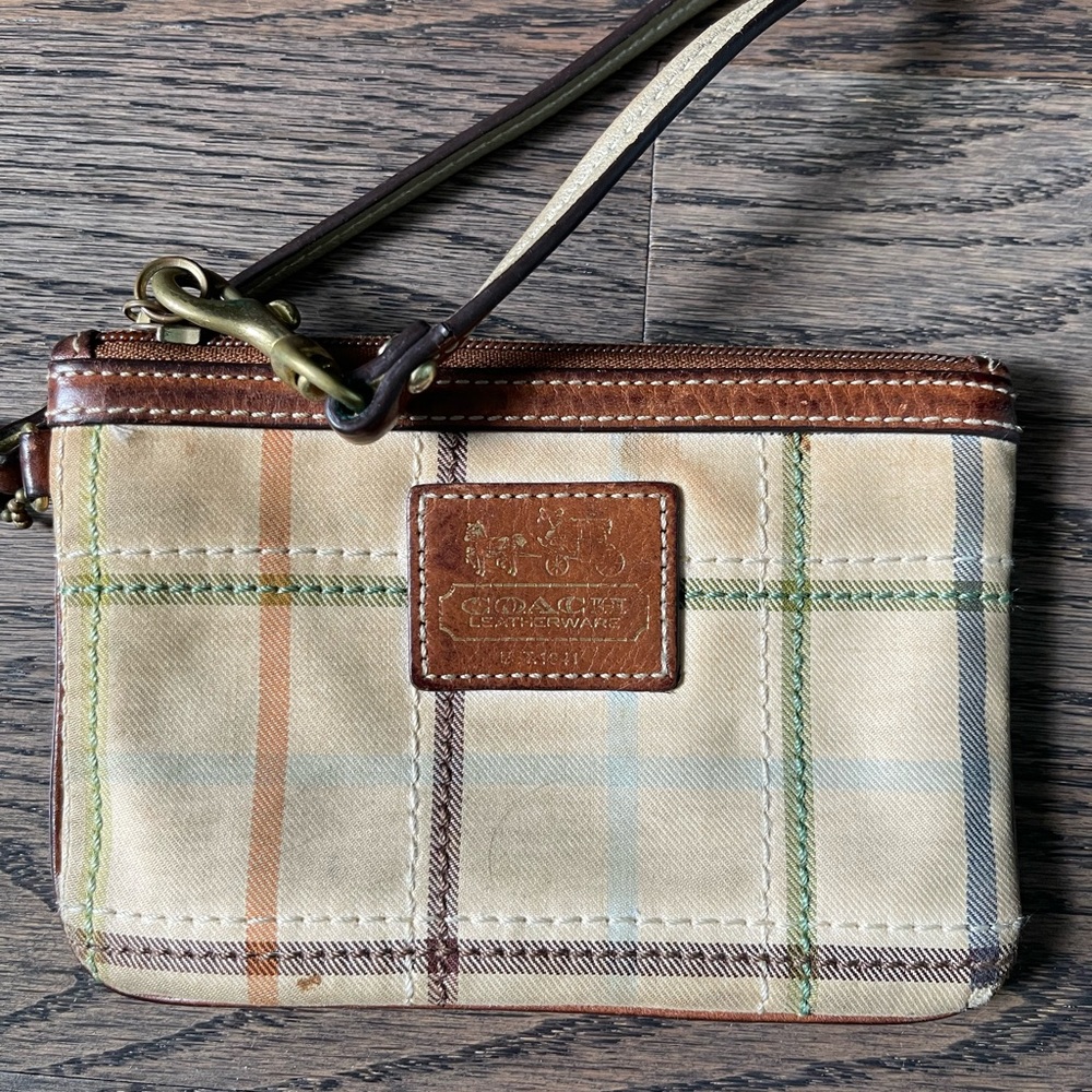 Coach plaid wristlet in fair condition. Needs a good cleaning but in great shape